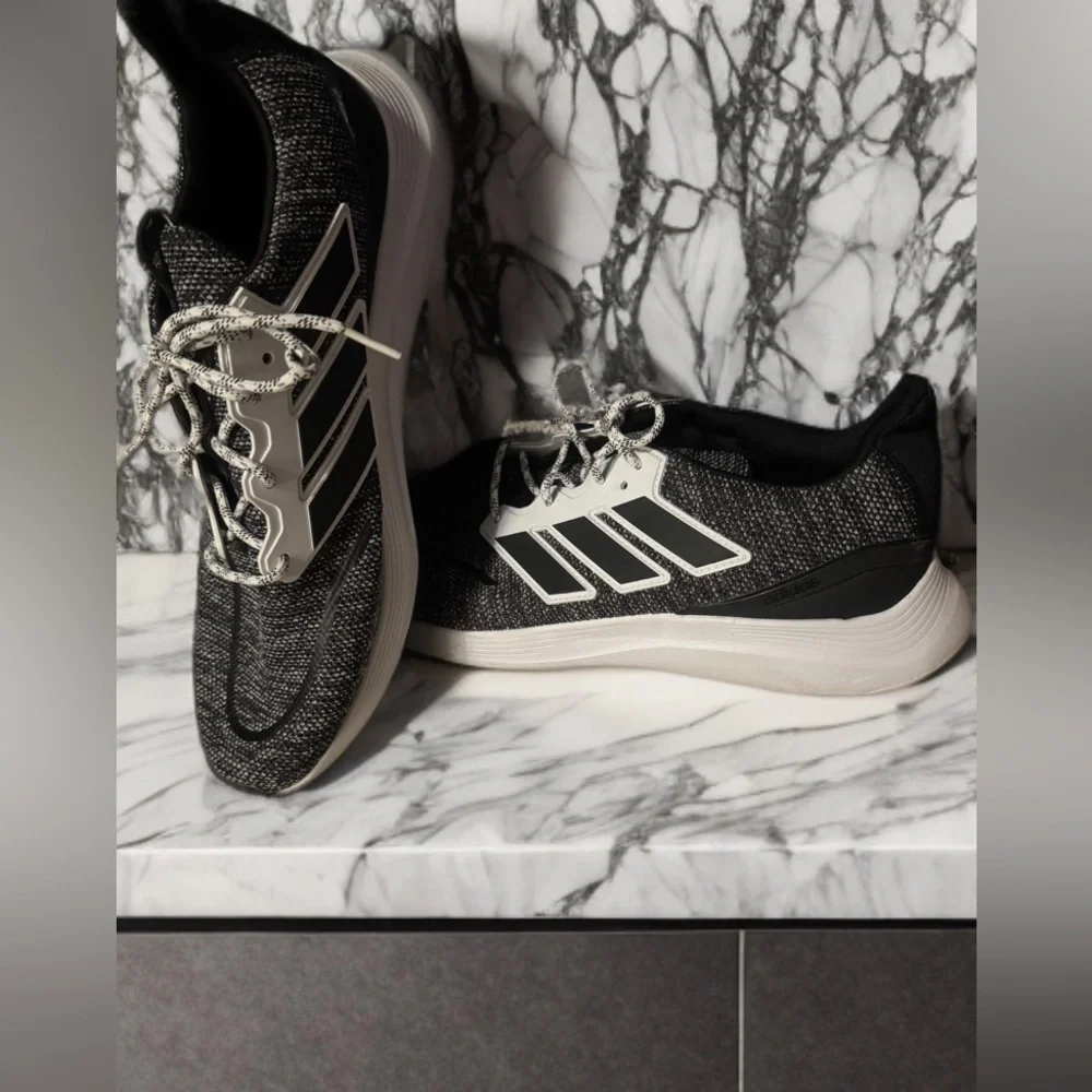 Adidas Black and White Sneakers with Sleek Design